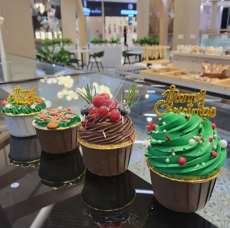 Decorated cupcakes made at Deli Bonbons